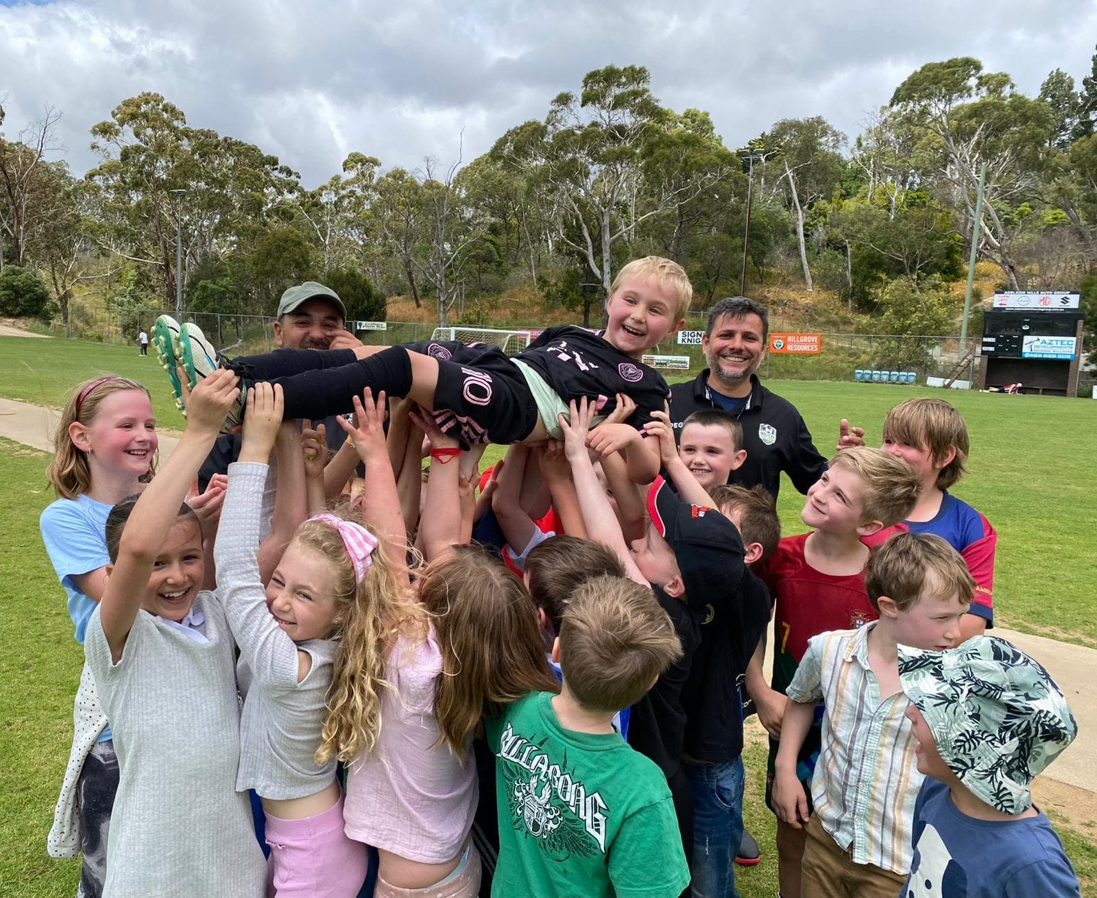 Kids soccer birthday party Adelaide – children cheering and celebrating at a Mastery Football Academy party