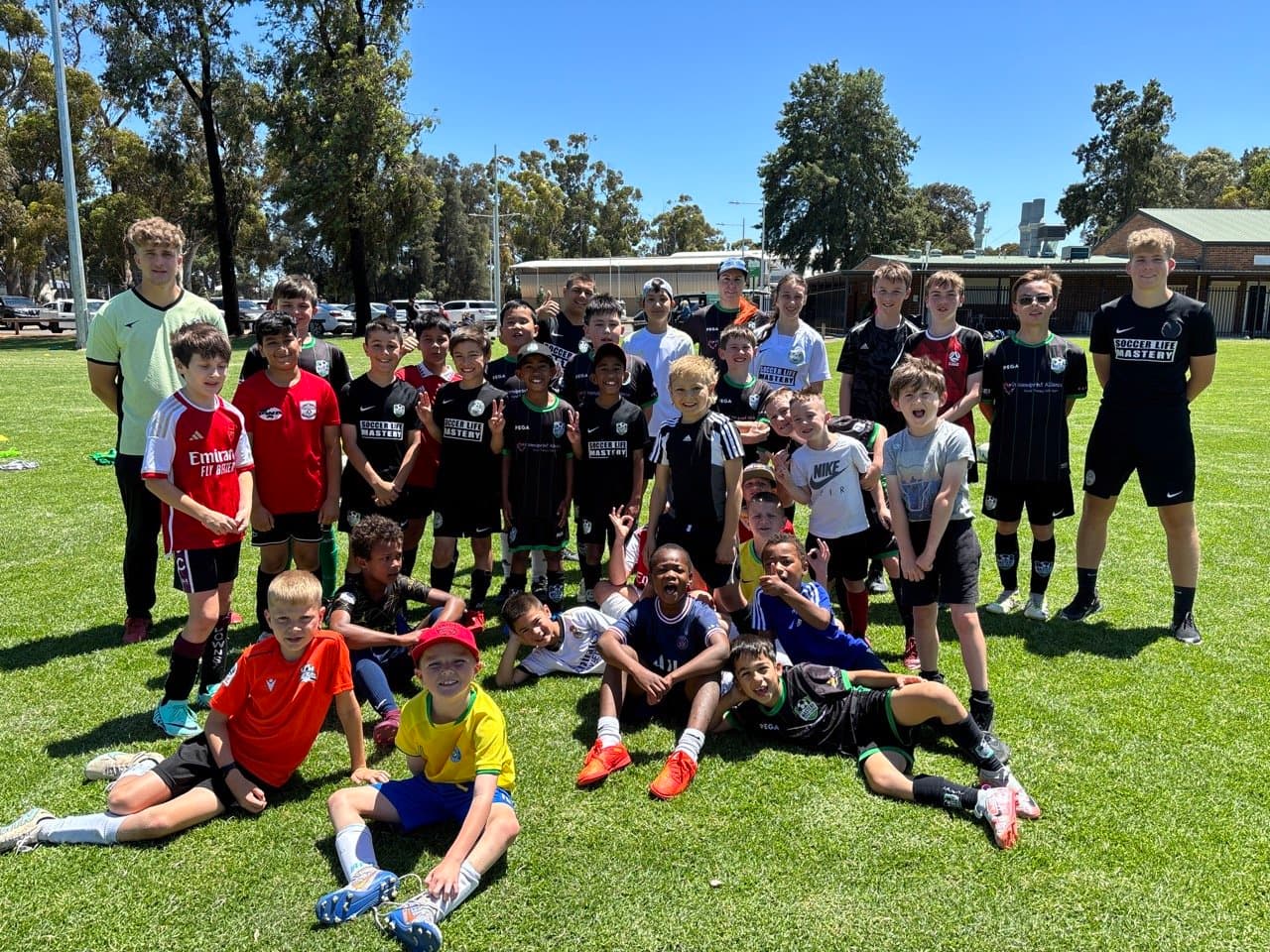 Kids enjoying Mastery Football Academy school holiday soccer clinic in Adelaide